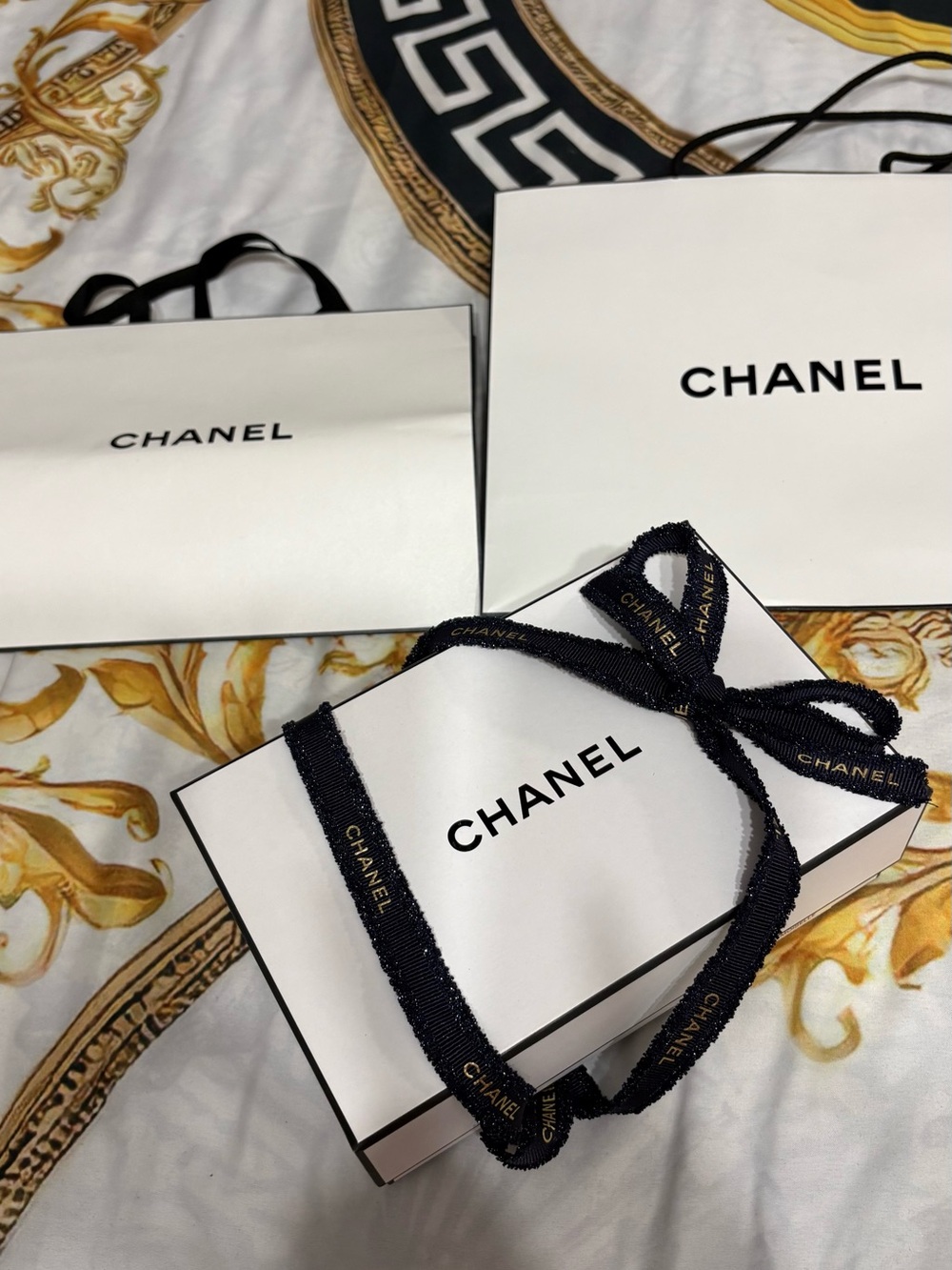 White Chanel & Christian Louboutin Tan shopping bag with Colorful Sticker Accent